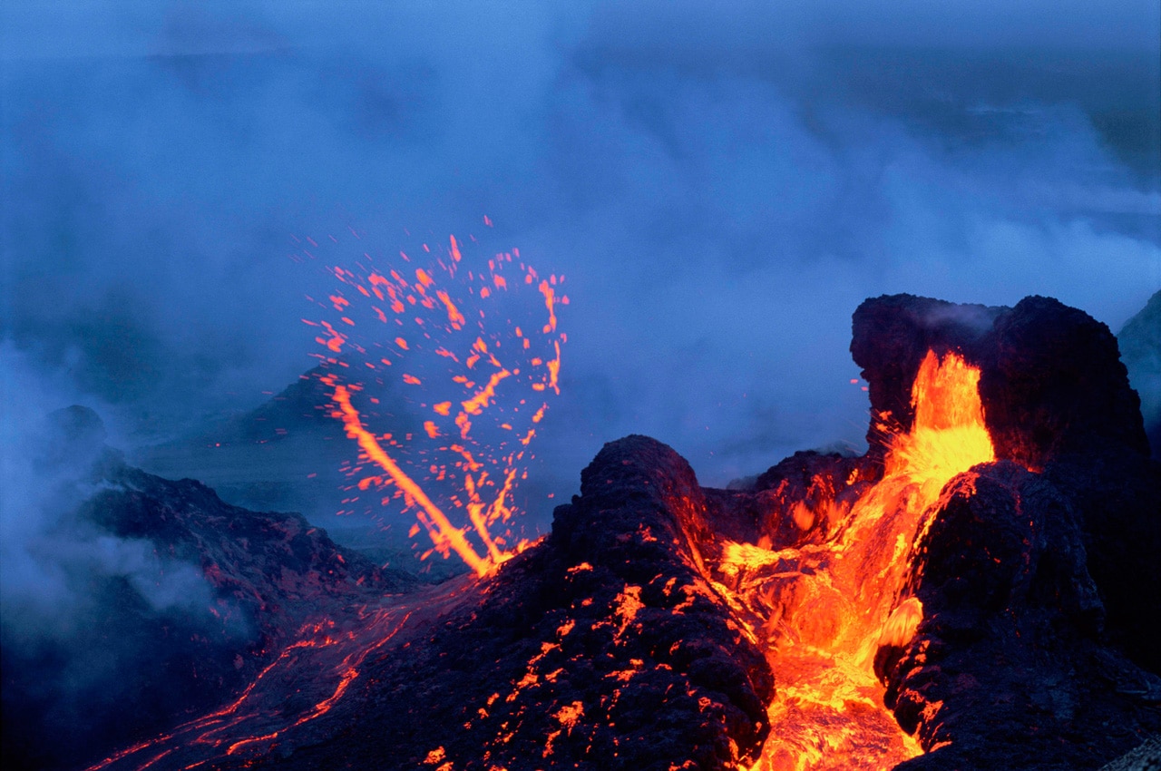 A heart-shaped lava spray appears above Kilauea, the most active volcano on Earth, in this photo by Brad Lewis.