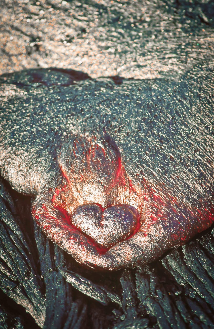 A heart shape in a lava flow appears at Kilauea, the most active volcano on Earth, in this photo by Brad Lewis.