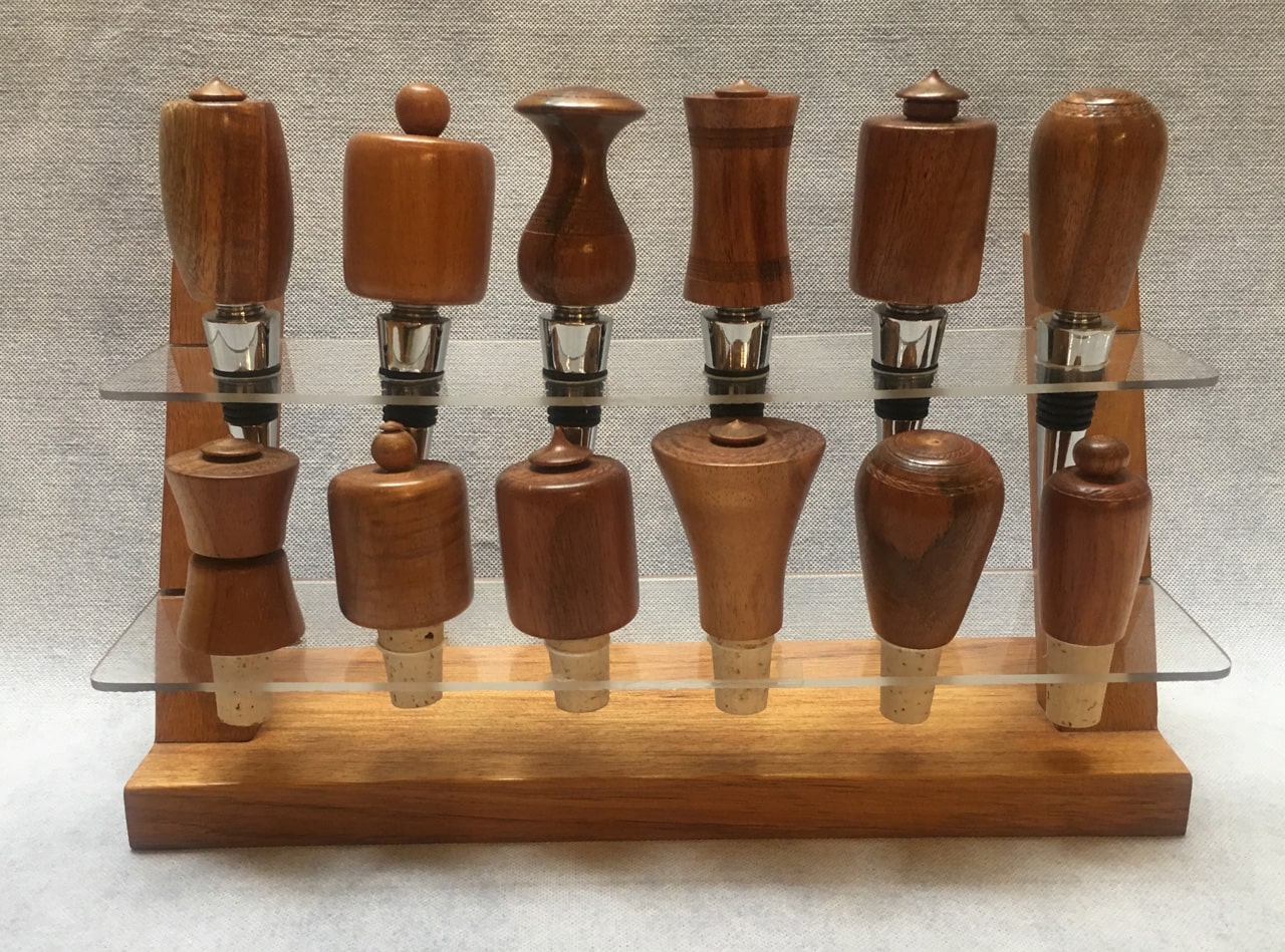 Two types of Winestoppers with built-in corkscrew and with just cork