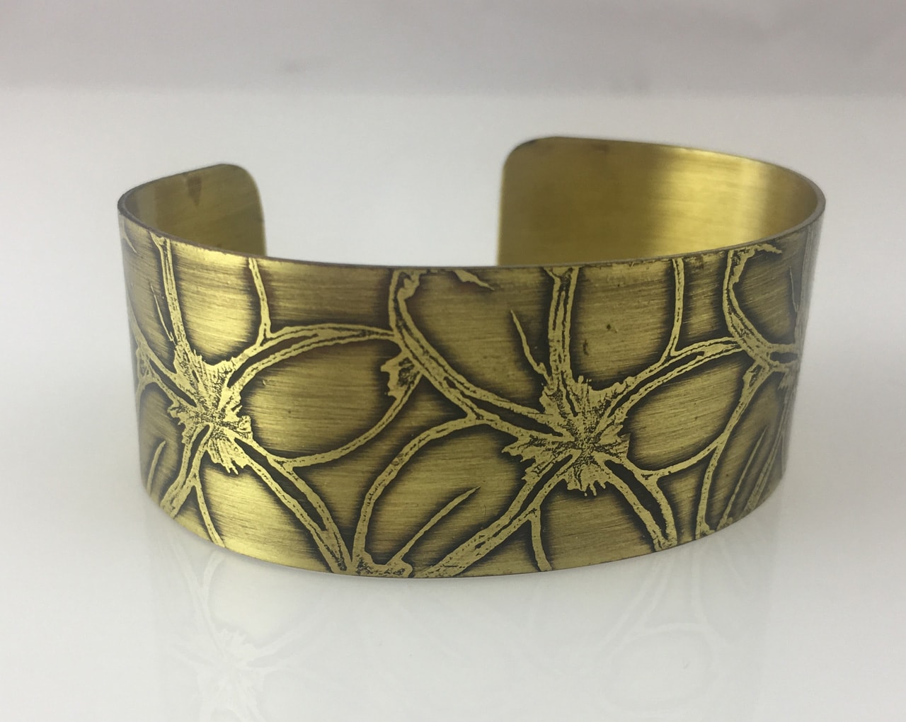 Brass Bracelet with Etched Plumeria Flowers by JoAnna Hernandez