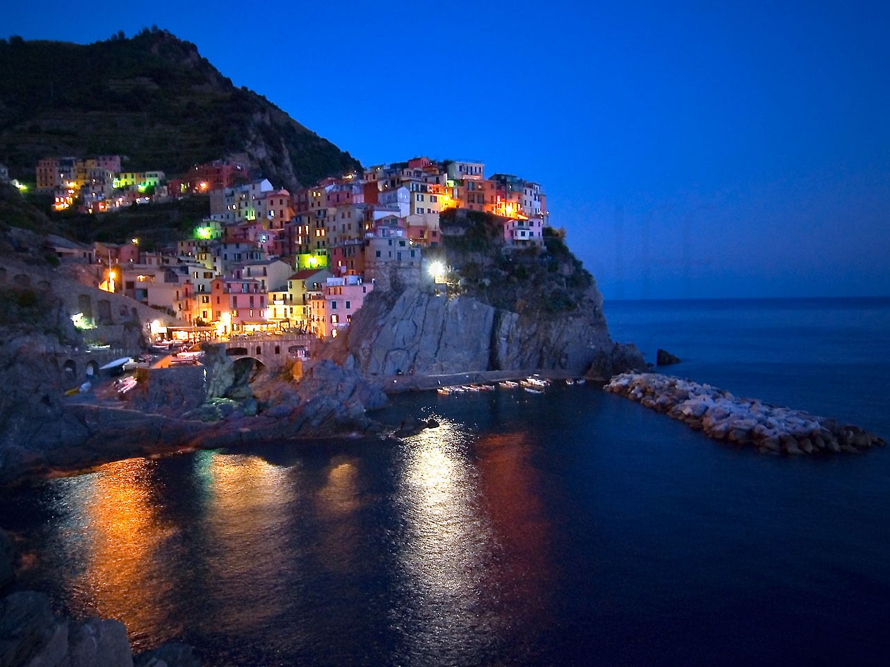 Captured at night in this photo by Marty Wolff, Manarola in Cinque Terre, Italy, may be the oldest town in the area