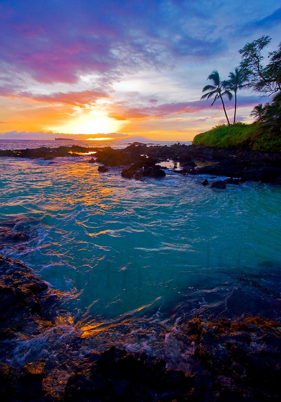 Captured in this photo by Marty Wolff, Pa'ako Cove - aka Secret Beach - is a popular wedding spot. One of the most beautiful beaches