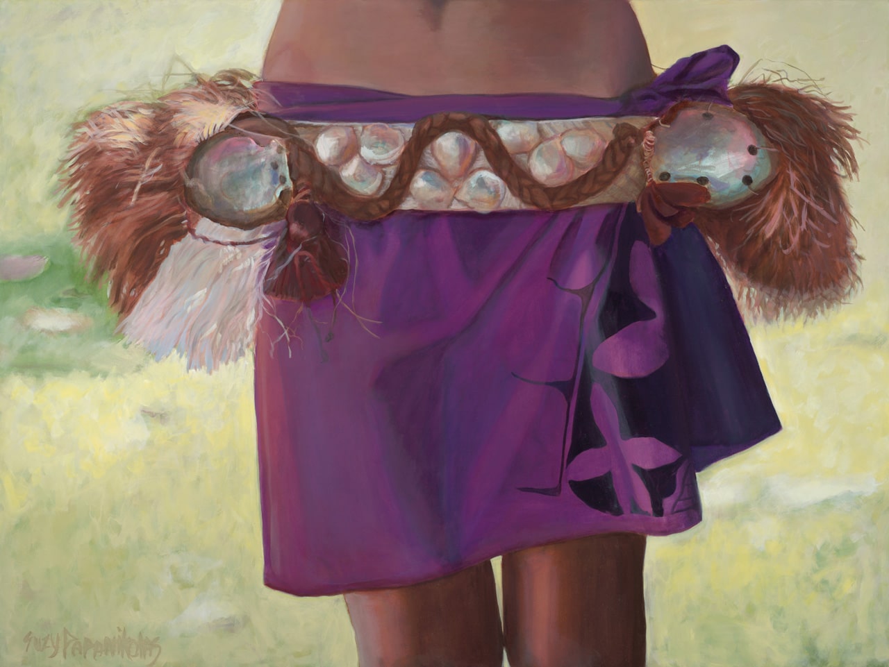 The torso of a female hula dancer wearing purple hula attire