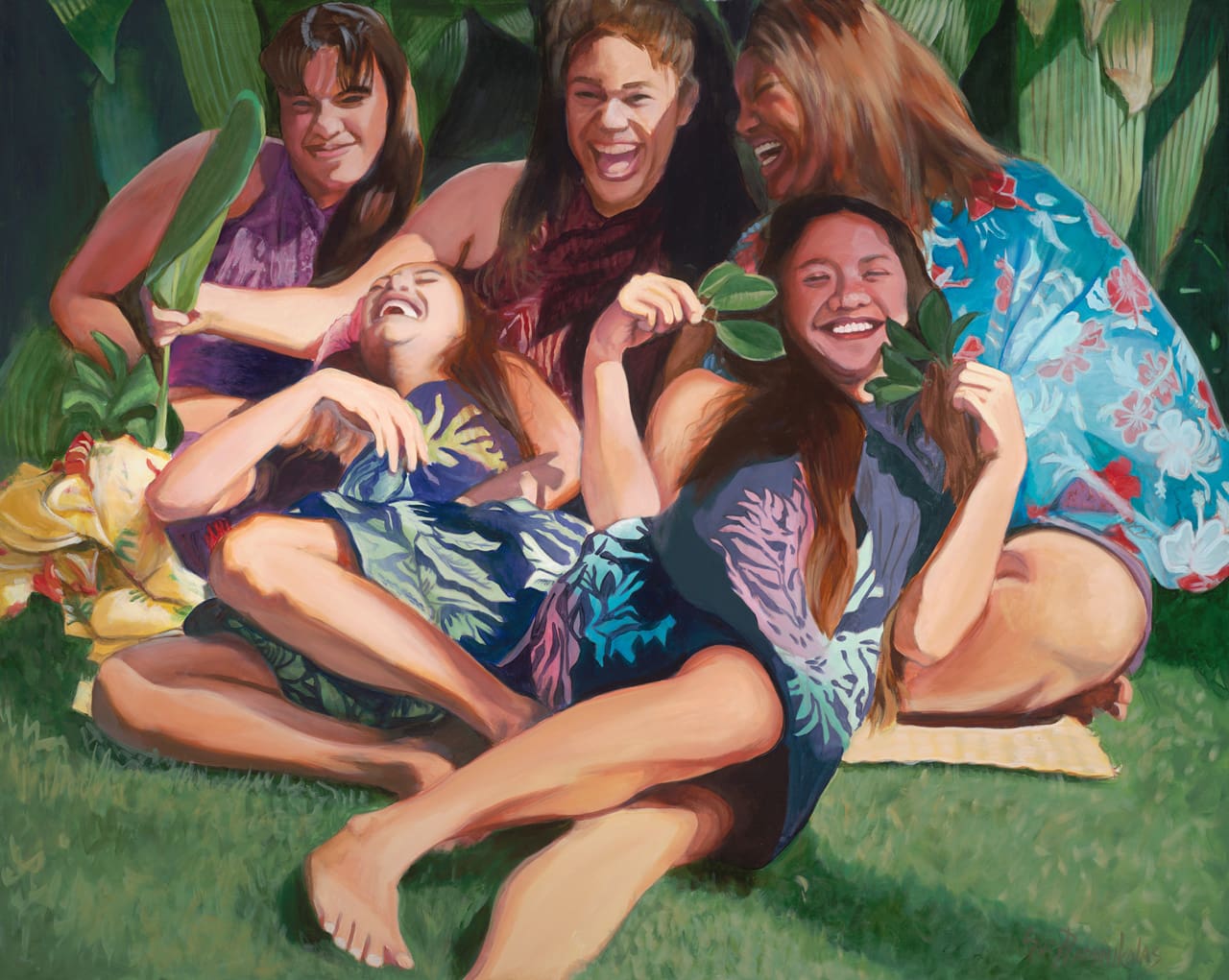 Five young girls sitting with one another and lauging