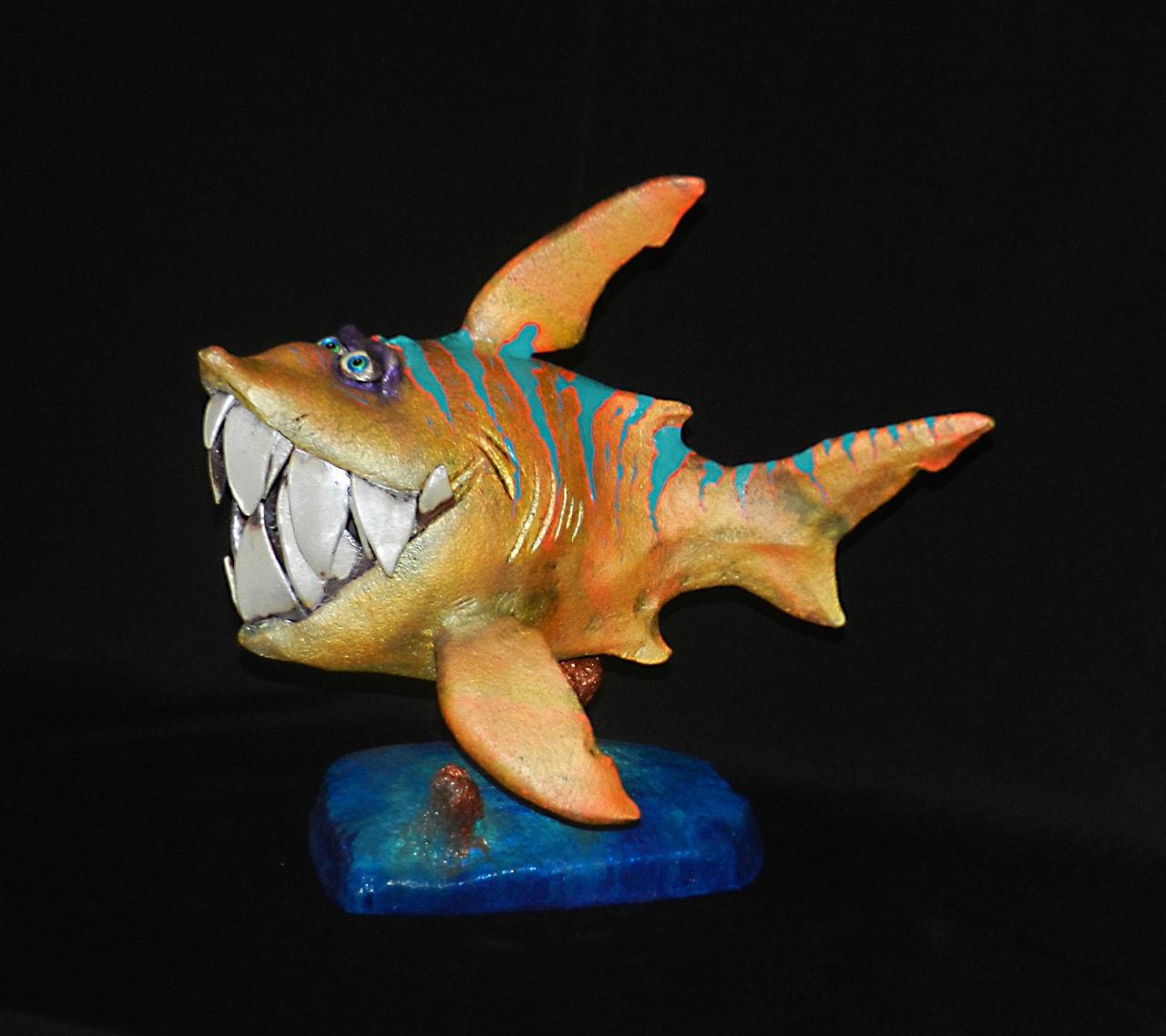 Paia Piranha by Steven Lee Smeltzer cartoonish whimsical clay sculpture of a piranha