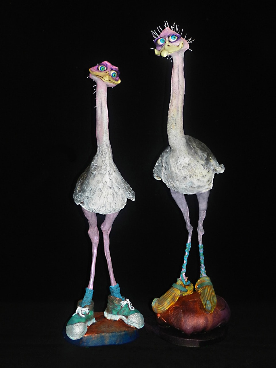 Ostrich by Steven Lee Smeltzer cartoonish whimsical clay sculpture of ostriches