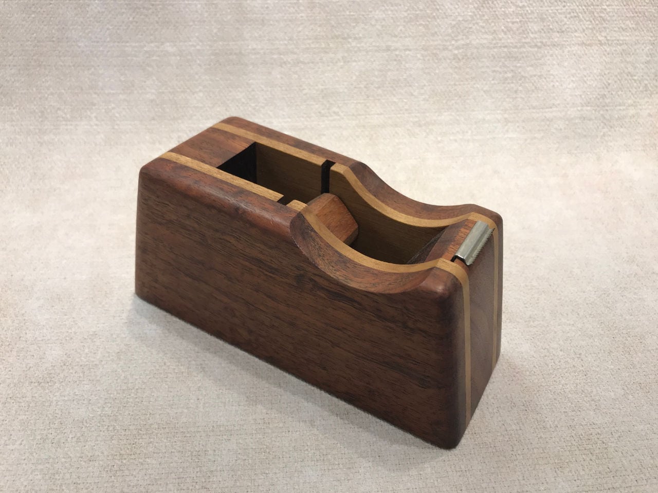 Wood tape dispenser in koa for the desk, handcrafted in Hawaii.