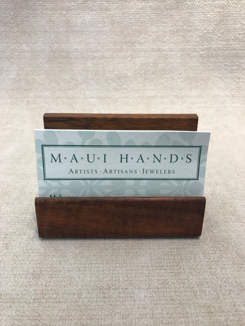 Horizontal wood business card holder in koa for the desk, handcrafted in Hawaii.