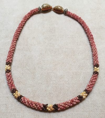 Niihau Lei, 19″ 4-Tie Poepoe with 14K gold-filled clasp. Created by master artisan Mailei Kanahele.