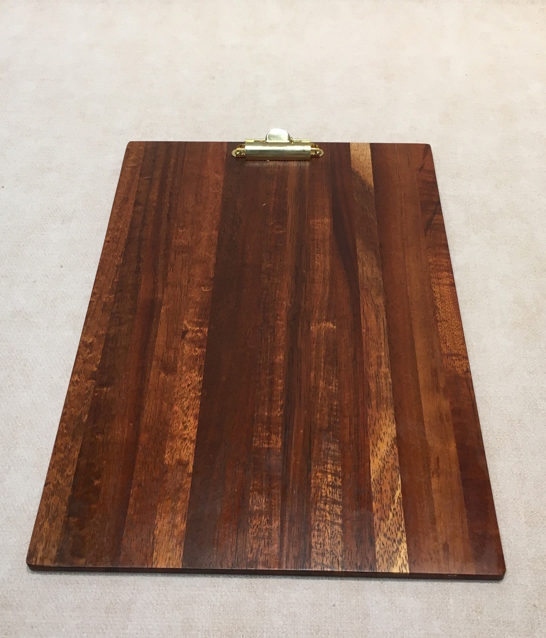 Wood clipboard in koa for the desk, handcrafted in Hawaii.