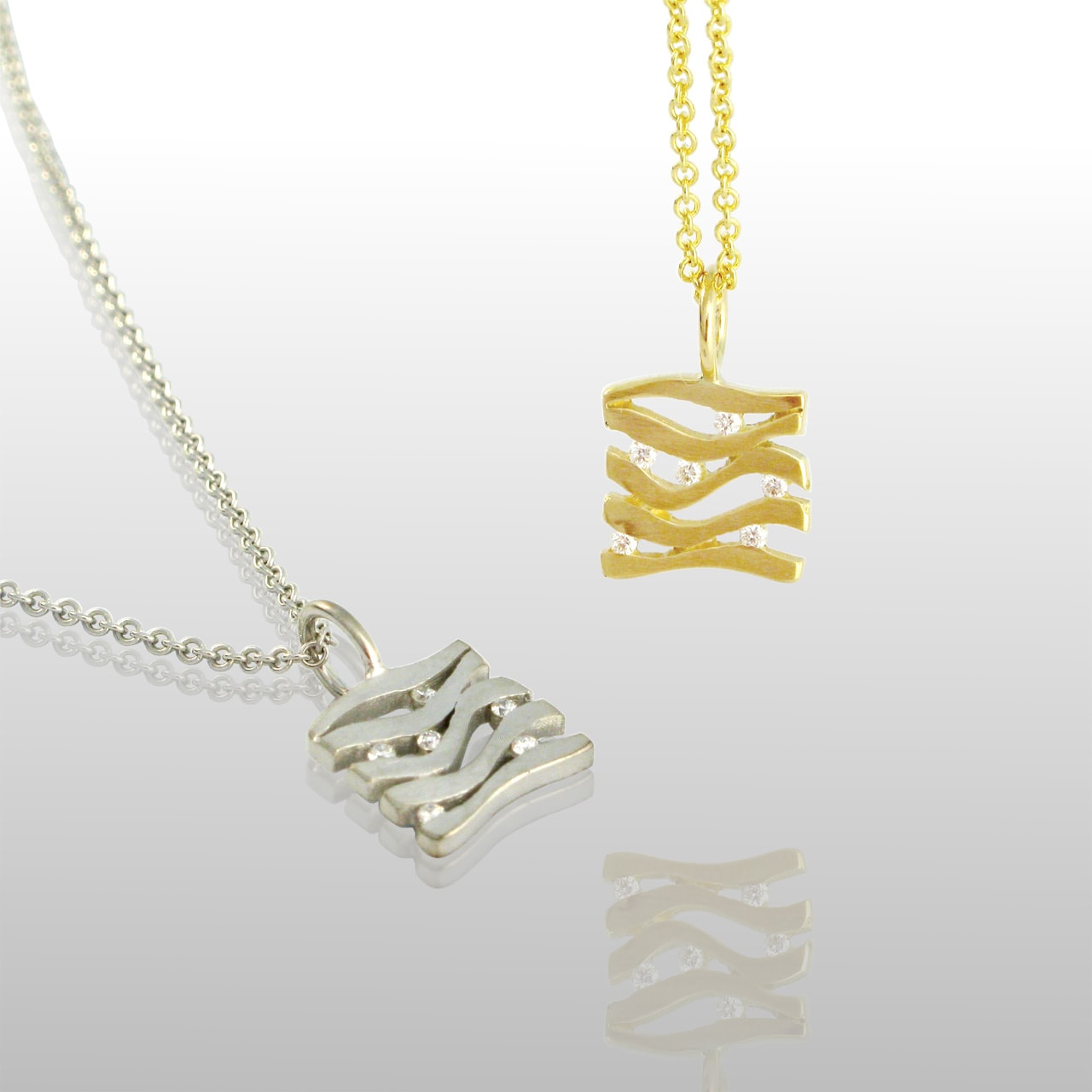 Two square pendants, yellow and white gold. With lines and diamonds