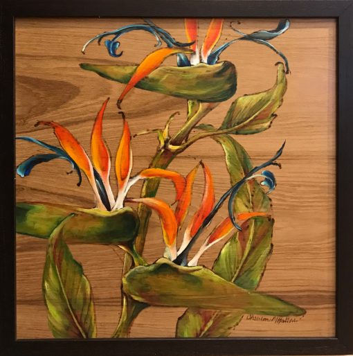 A wood burned and oil painted wood panel of three birds of paradise flowers with leaves