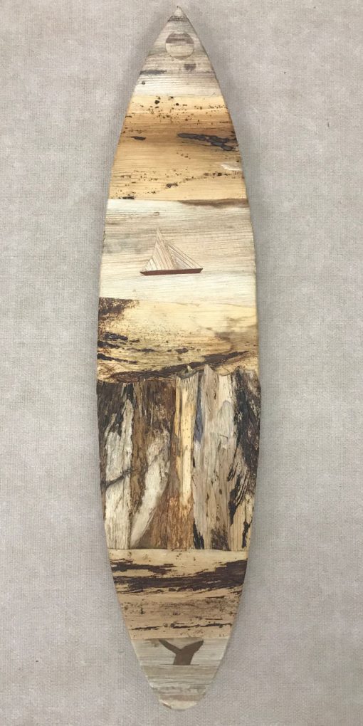 Medium surfboard wall hanging from the mind of Baz Cumberbatch. He carves the background from wood, then adds layers of natural fibers by hand
