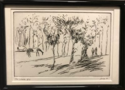 an original print of a pasture looking scene with large trees, horses, and two people walking