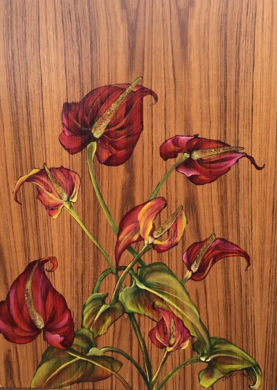 an oil painting of red anthurium flowers on a teak wood panel.