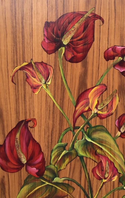 an oil painting of red anthurium flowers on a teak wood panel.