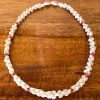 Ni'ihau Lei, 18" Light Blue Roselani Kipona. Crafted by master artisan Kaleialoha Roback.