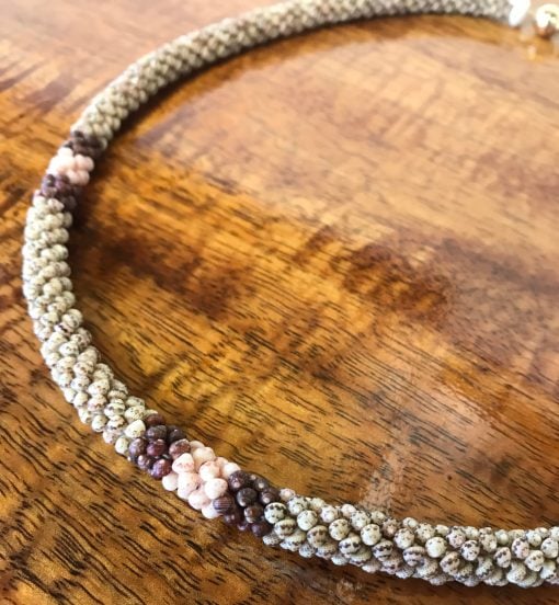 Ni'hau Lei, 18" Poepoe with 14K gold-filled clasp. Created by master artisan Uilani Kanahele.