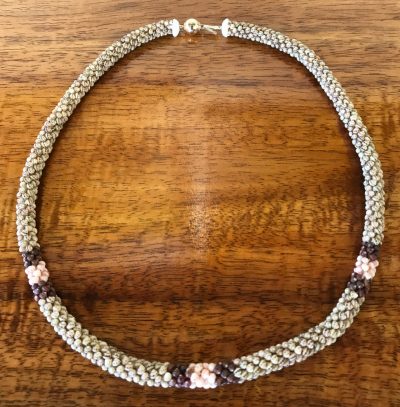 Ni'hau Lei, 18" Poepoe with 14K gold-filled clasp. Created by master artisan Uilani Kanahele.