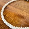 Ni'ihau Lei, 21" Pikake Momi, Brown Tip. Crafted by master artisan Mo Katoush.