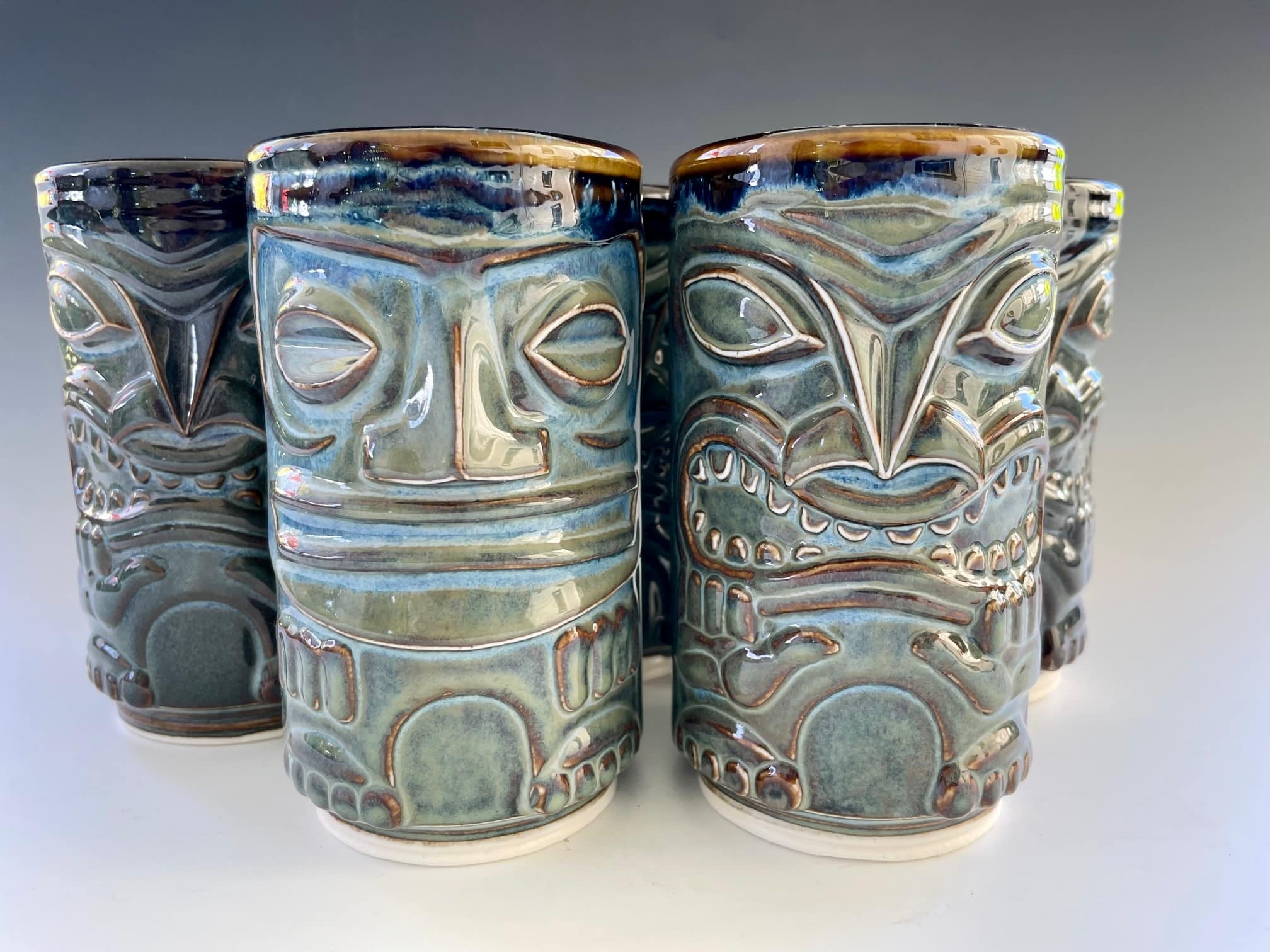 Tiki Mugs by Ocean Raku Pottery